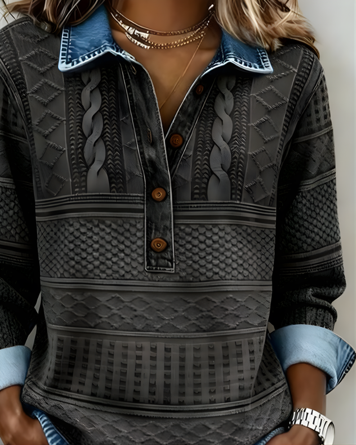 Detailed shot of the collar and button closure on the blue collared sweatshirt, emphasizing quality craftsmanship.