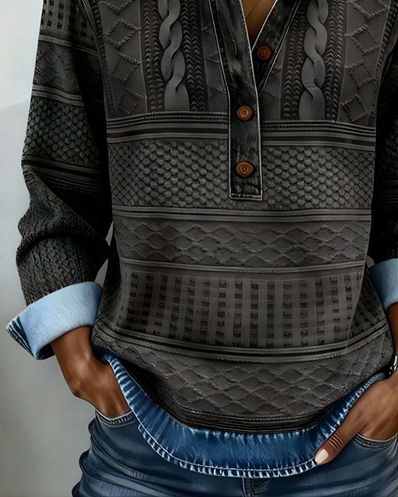 Flat lay of the coffee half-button collared sweatshirt, displaying its soft material and simple elegance.