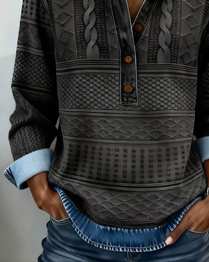 Flat lay of the coffee half-button collared sweatshirt, displaying its soft material and simple elegance.