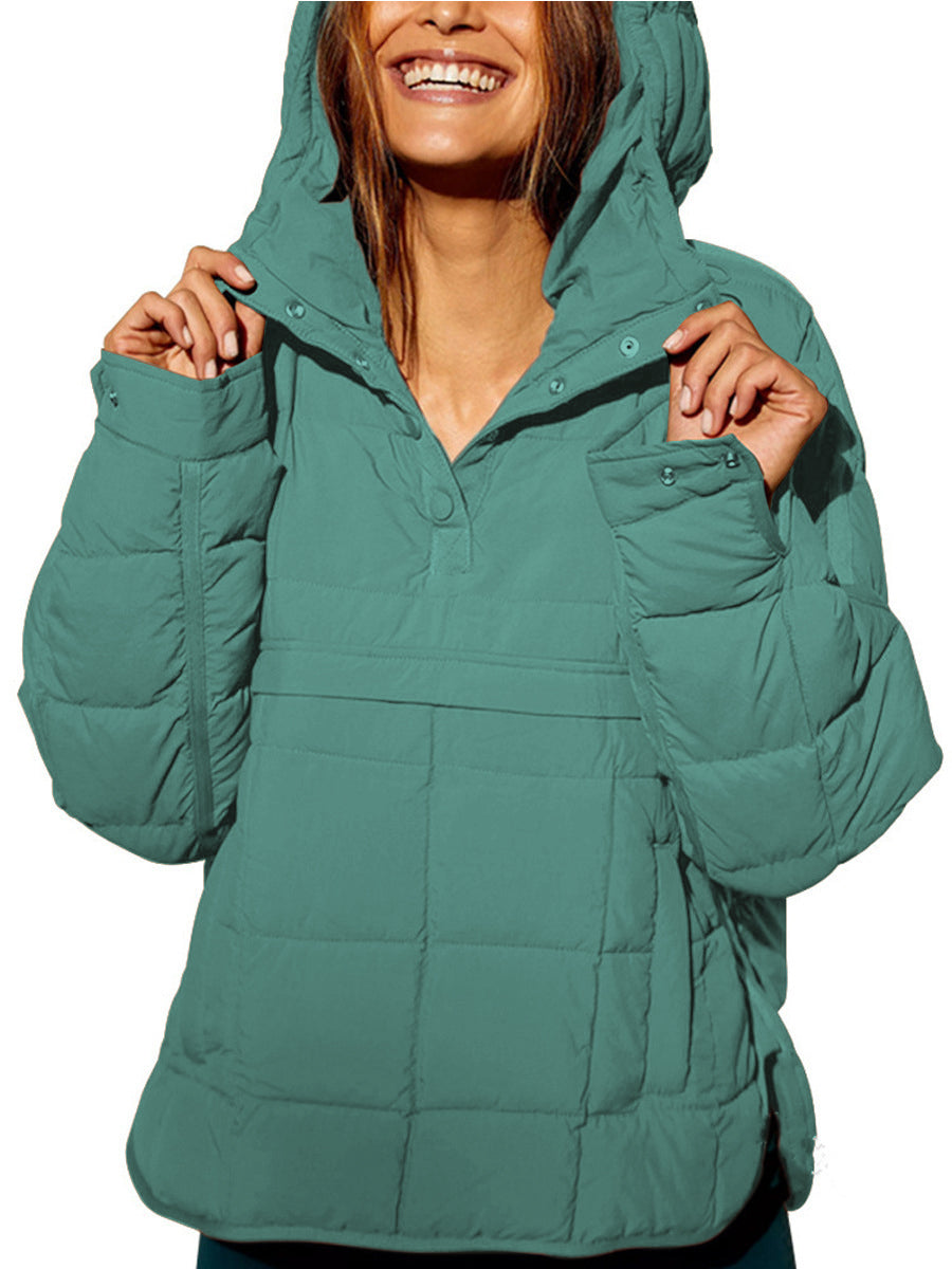 Front view of the green oversized hooded pullover jacket laid flat, displaying its full design and color.