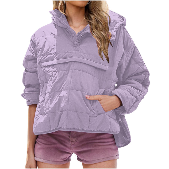 Full body shot of a woman wearing the pink oversized hooded pullover jacket, styled with complementary accessories.