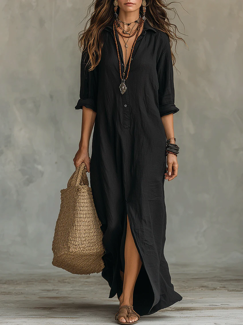 Front view of a woman wearing the Calista relaxed maxi shirt dress in a light color, showcasing its flowing silhouette.