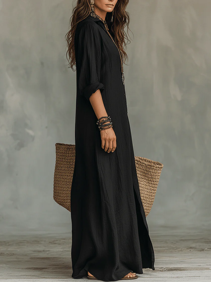 Back view of the Calista maxi shirt dress on a model, emphasizing the relaxed drape and full length.