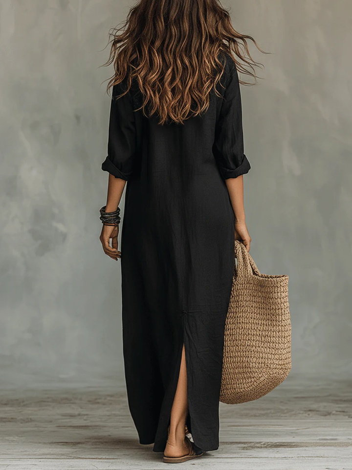 A woman enjoying a casual outdoor setting while wearing the stylish Calista relaxed maxi shirt dress in green.
