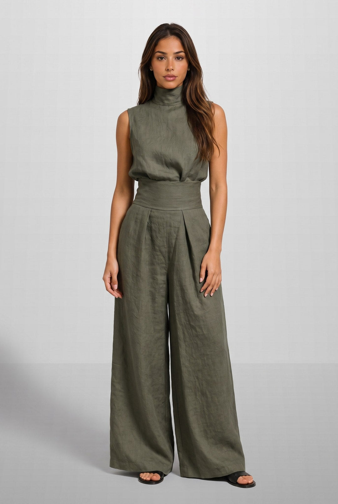 A close-up detail of the breathable cotton and linen fabric texture of the light blue jumpsuit.