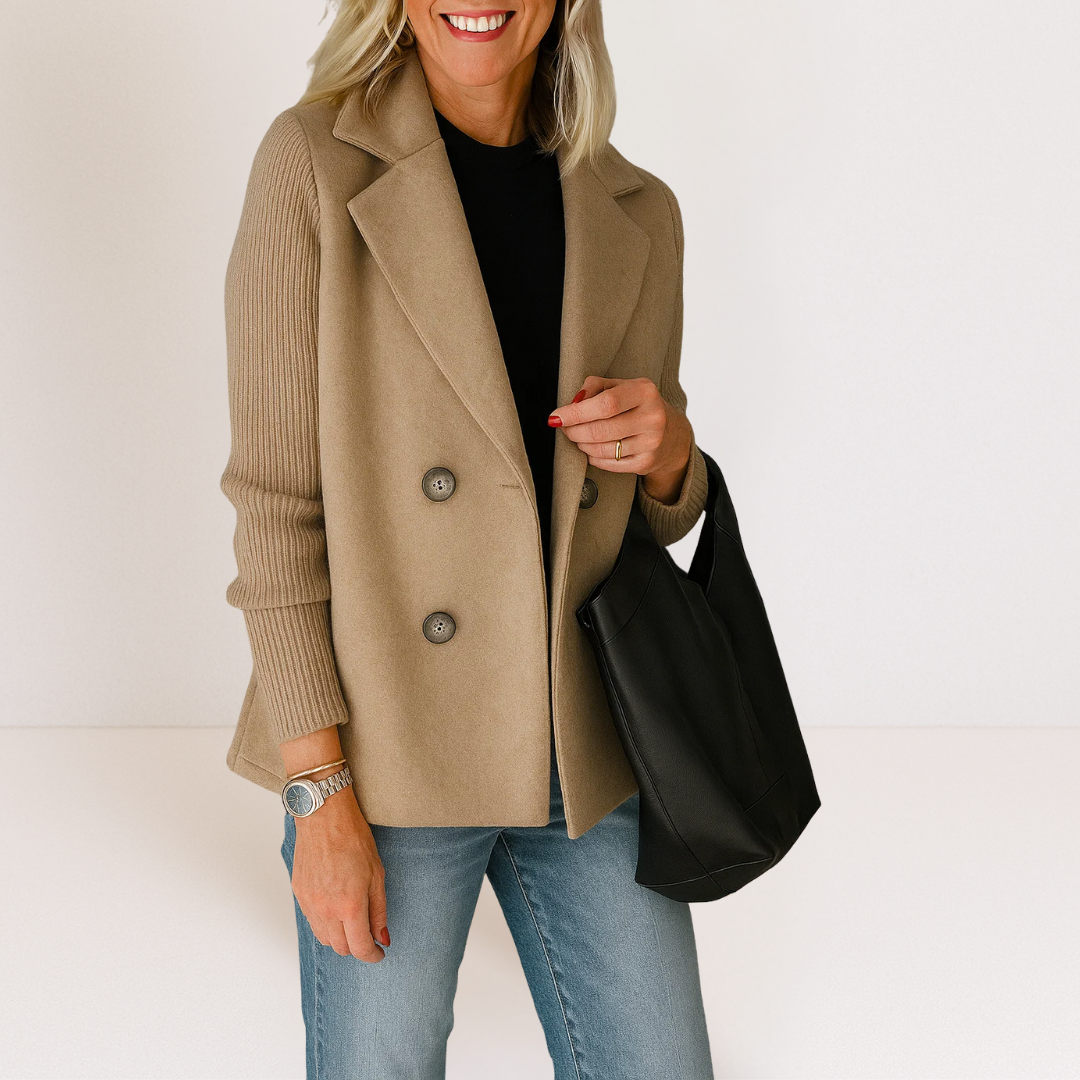 Front view of the Evadne knit sleeve blazer in white, open, showing the inner lining and versatile styling.