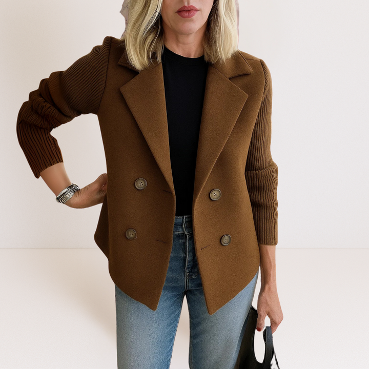 Overhead shot of the khaki Evadne knit sleeve blazer laid flat, showing the full design and fabric consistency.