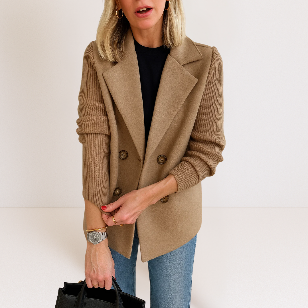 Lifestyle shot of the green Evadne knit sleeve blazer, styled casually with jeans and a t-shirt for a chic look.
