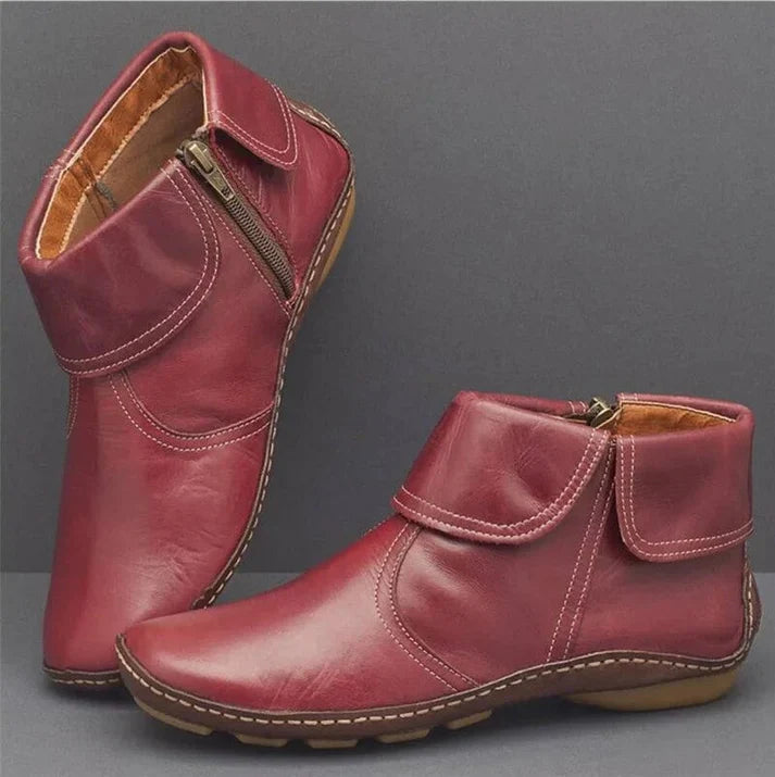 Side view of a dark brown Kaelen orthopedic waterproof boot, highlighting the textured synthetic leather and robust sole.