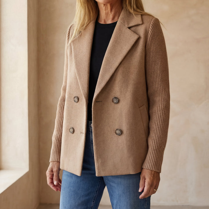 Back view of the Kinsley jacket, emphasizing its clean lines and overall drape.