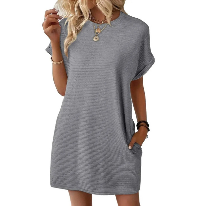 Close-up of the fabric, illustrating the quality and soft feel of the Kira casual summer dress.