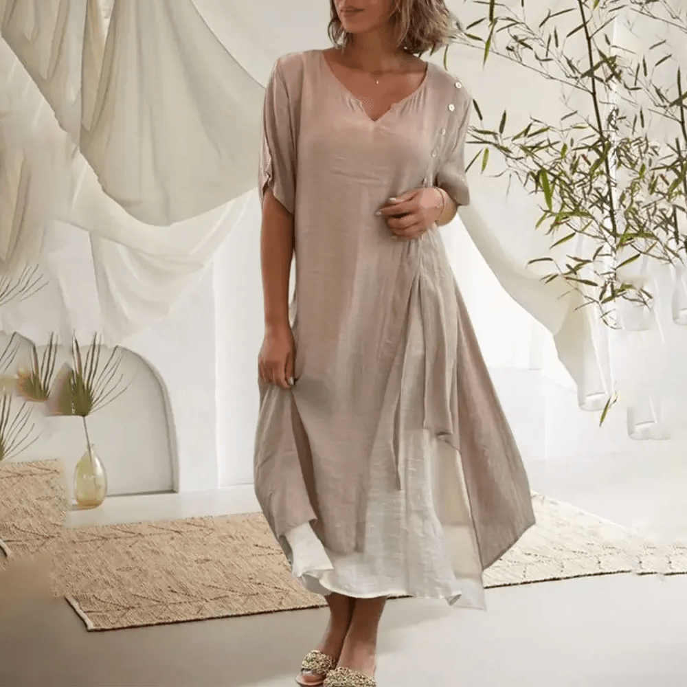 Full-length view of a woman wearing the Liana classic maxi dress, emphasizing its versatility.