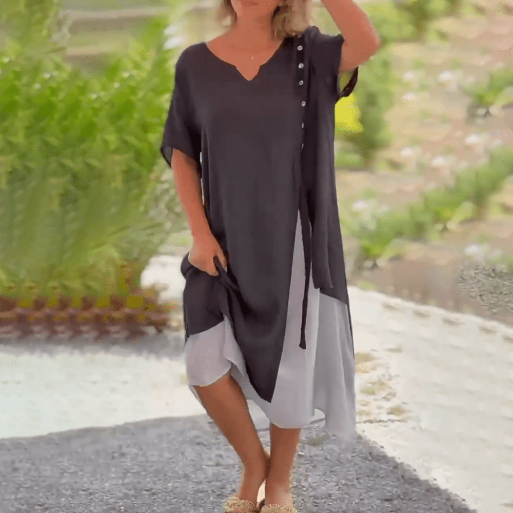 Back view of the Liana classic maxi dress in blue, highlighting the elegant drape.