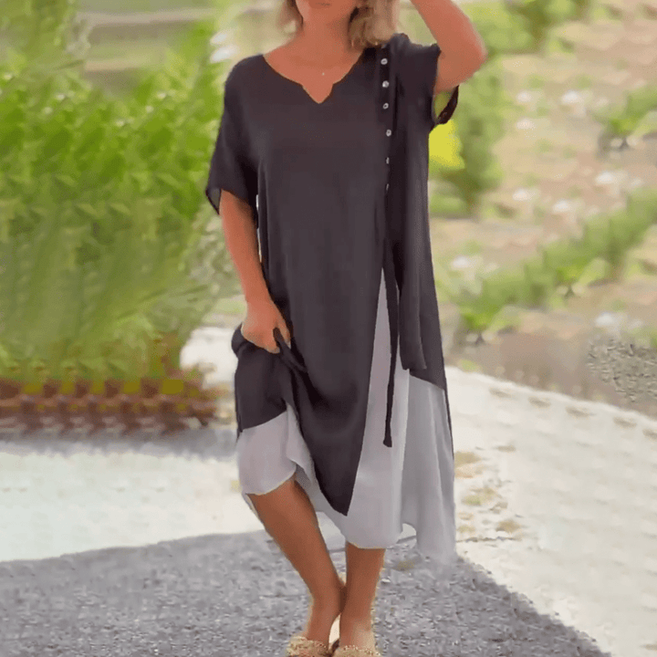 Back view of the Liana classic maxi dress in blue, highlighting the elegant drape.