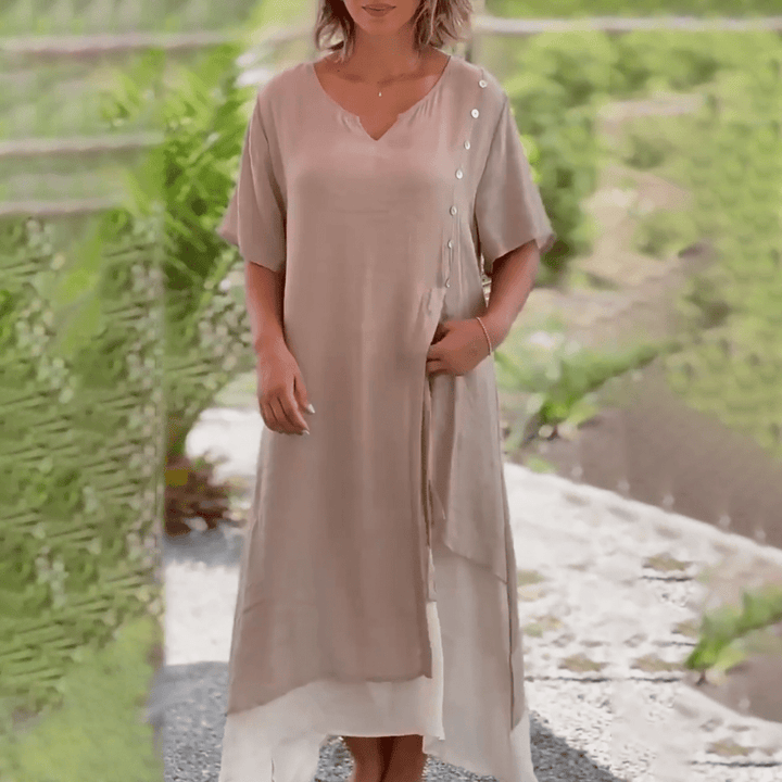 A collection of Liana classic maxi dresses in various colors on display.