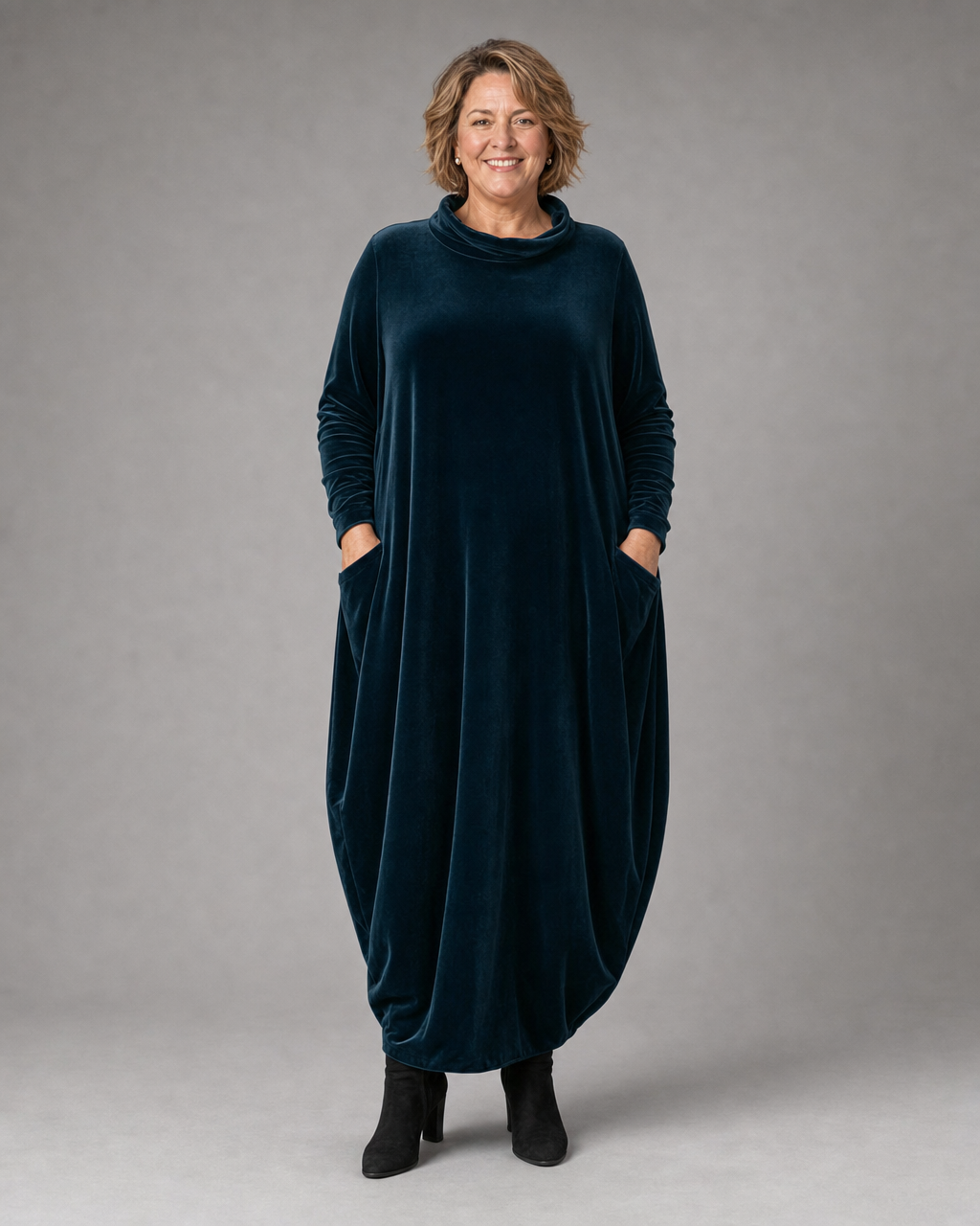Close-up of the luxurious velvet texture on the Rosalind dress, showing its subtle sheen.