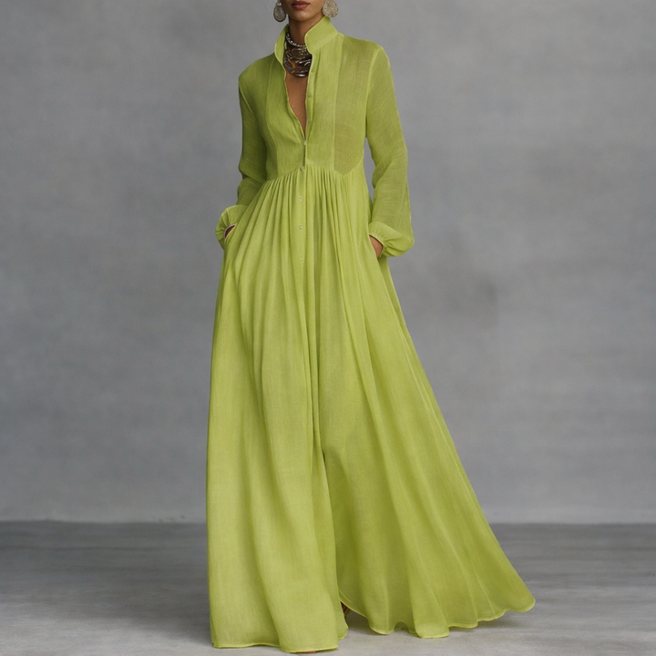 Front view of Seraphina flowy maxi dress in light blue, showcasing its elegant drape and V-neck design.