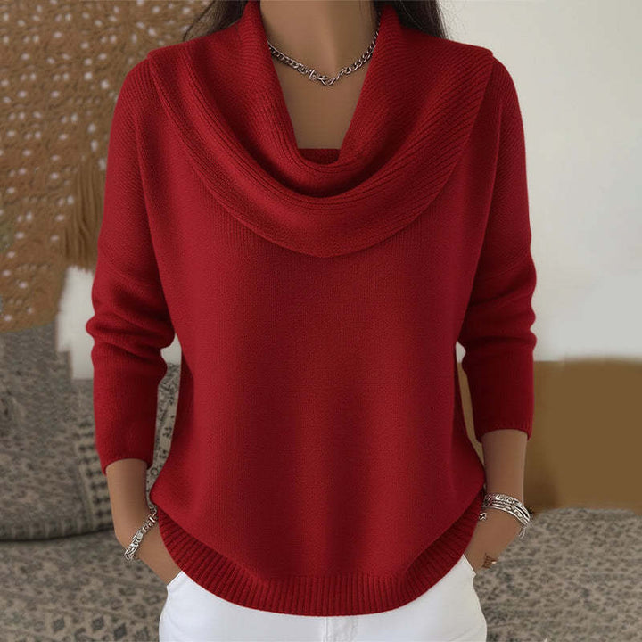 Front view of a woman wearing the stylish beige Seraphina collared sweater, showcasing its elegant drape.