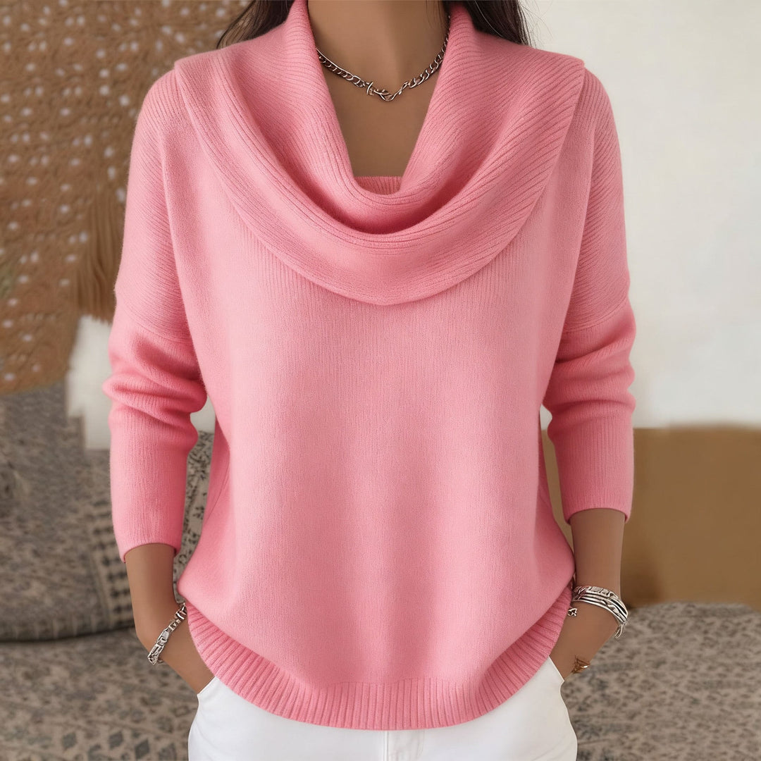Close-up of the softly draped collar detail on the Seraphina knit sweater, highlighting its refined design.