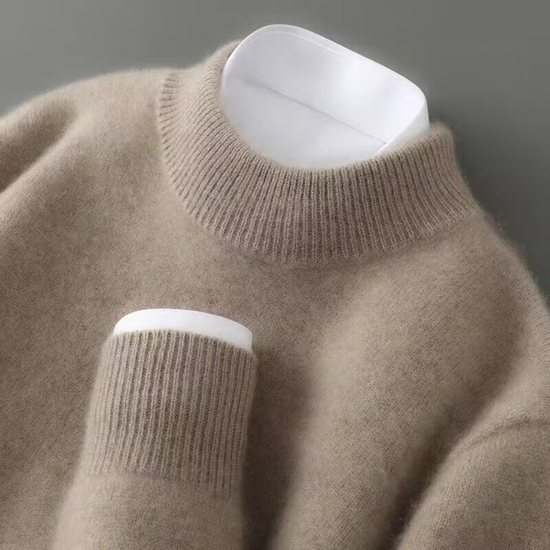 Close-up detail of the ribbed mock neck on a high-quality cashmere sweater, highlighting stitching and material.