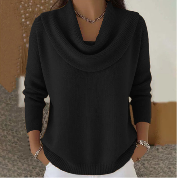Side profile of a woman in the relaxed fit Seraphina sweater, emphasizing the comfortable silhouette.