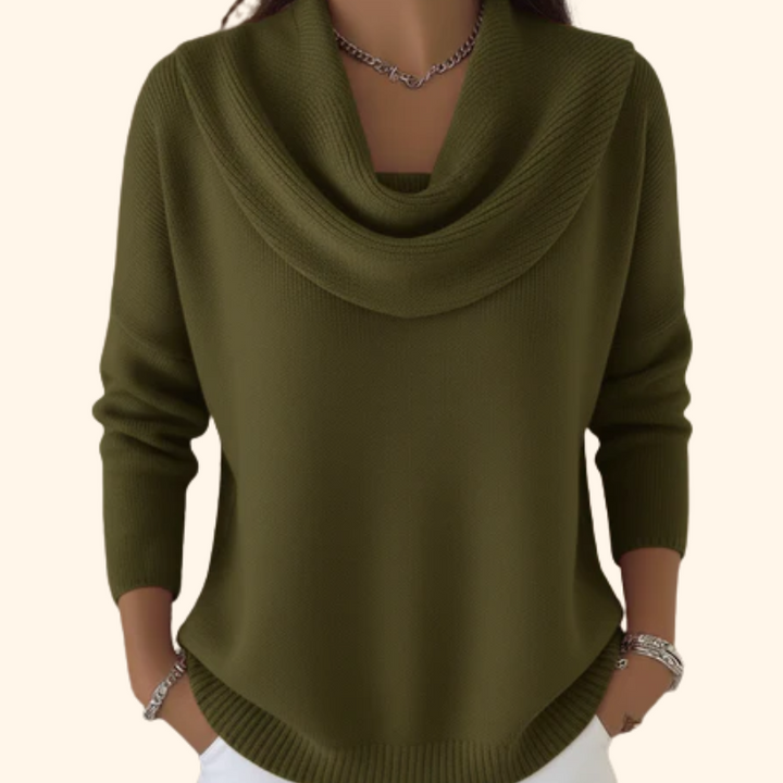 Woman smiling while wearing the black Seraphina collared sweater, illustrating its versatility for various moods.