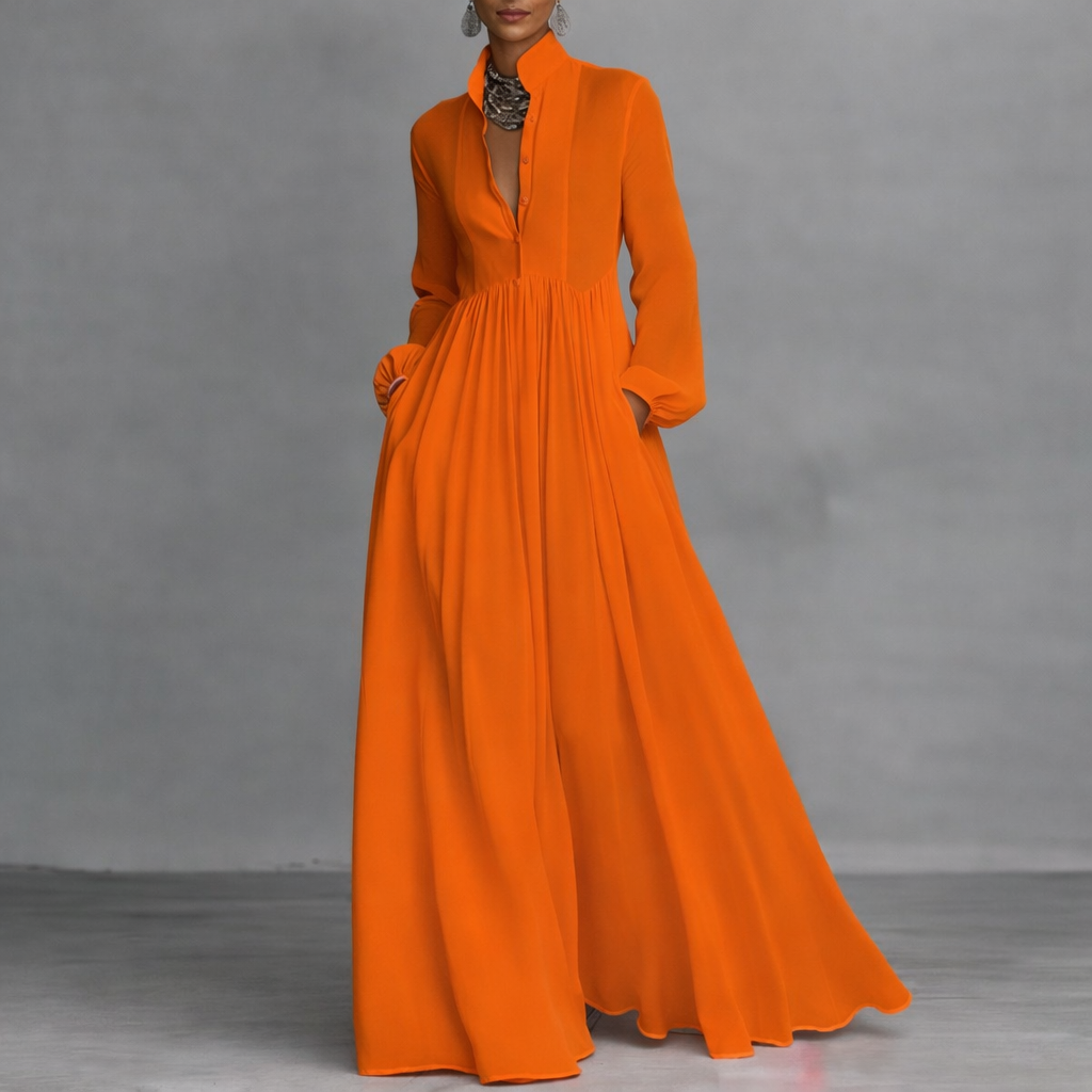 Detail shot of the hemline of the Seraphina flowy maxi dress, showing the wide, comfortable flow of the garment.