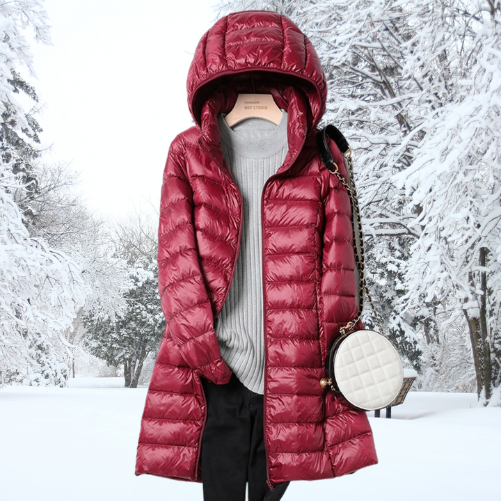 Back view of the pink Seraphina ultralight down jacket, showing the smooth, lightweight design.