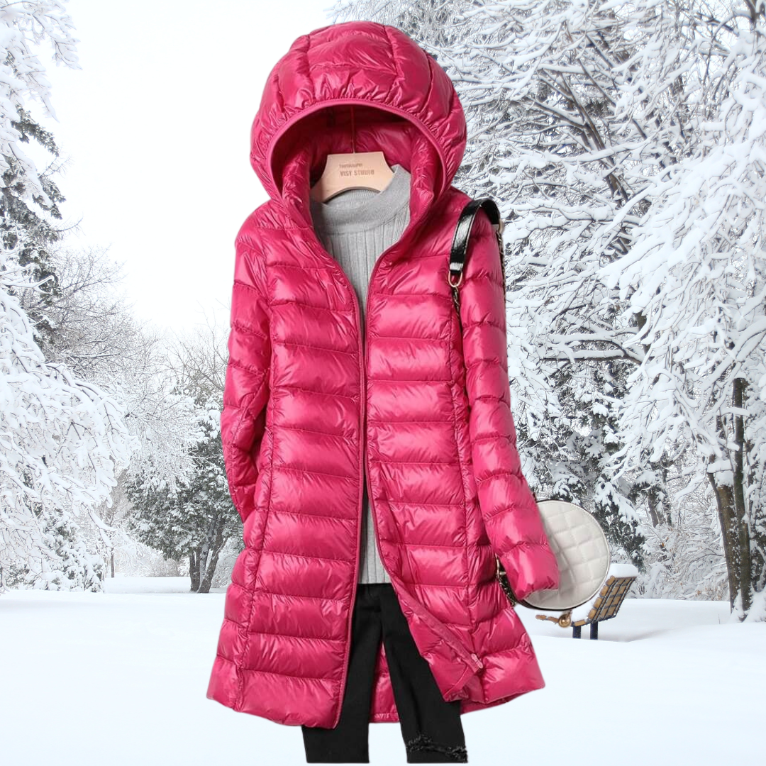Lifestyle shot of the burgundy Seraphina ultralight down jacket being worn in a casual, urban setting.