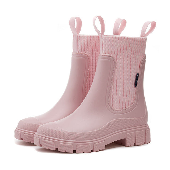 Detailed shot of the zipper closure on a black Seraphina waterproof ankle boot, indicating ease of wear.