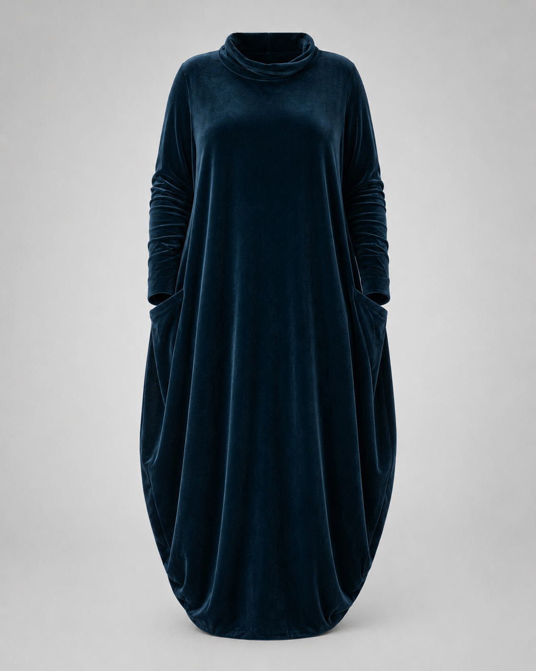 Front view of the Serena elegant velvet maxi dress in dark green, showcasing its relaxed draped fit.