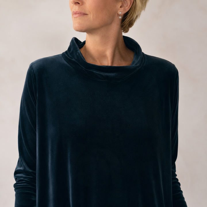 Model wearing the black Serena velvet maxi dress, demonstrating its comfortable and elegant silhouette.