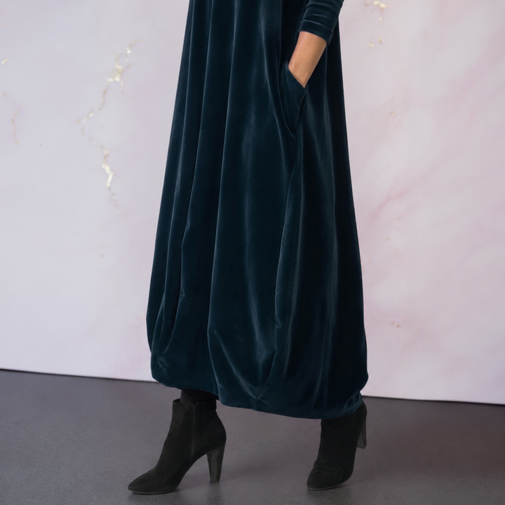 Detail shot of the practical side pocket on the Serena elegant maxi dress.