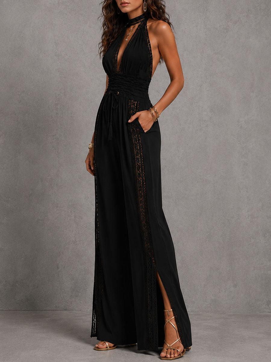 Back view of the flowing wide-leg jumpsuit, showcasing the halter neckline straps.