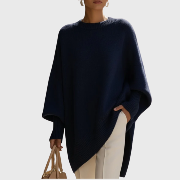 Back view of the Solana oversize poncho pullover in brown, showing the seamless design and coverage.