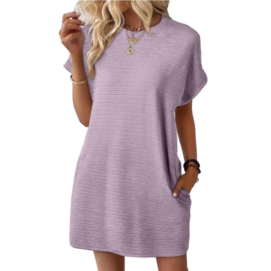 Close-up of the fabric texture on a light purple Valerie casual round neck dress, showing material quality.
