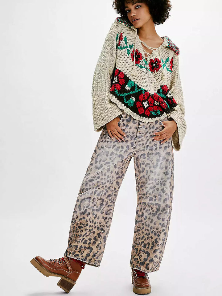 Another lifestyle shot, focusing on the movement and comfort of the wide-leg leopard print denim.